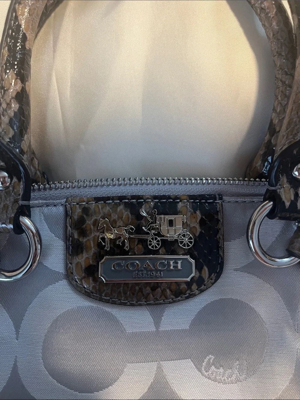 Coach satchel signature